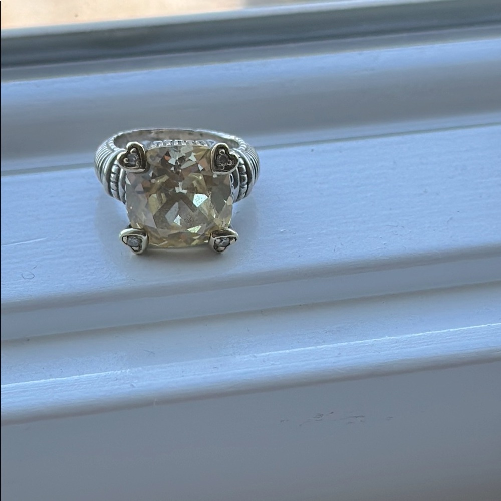 Judith Ripka  Silver & Gold Ring
Sterling silver 18k gold trim around diamonds